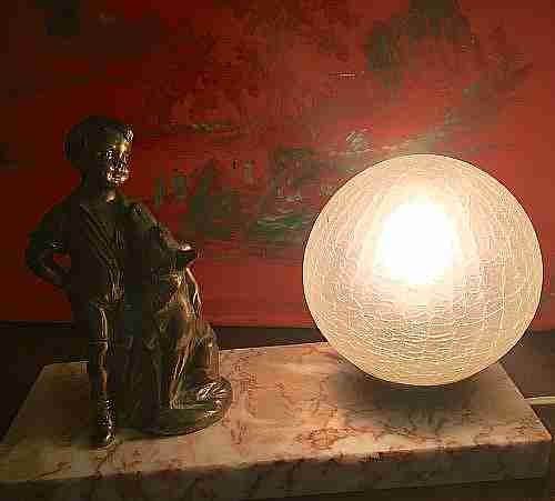 evocative 1920 night light boy and best friend bronze on marble