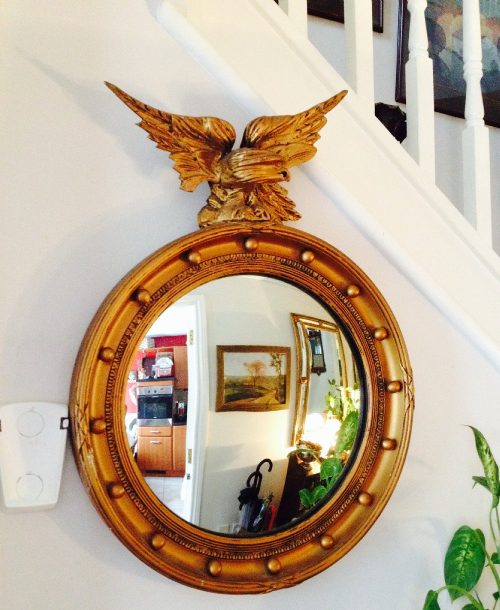 traditional regency style convex eagle mirror